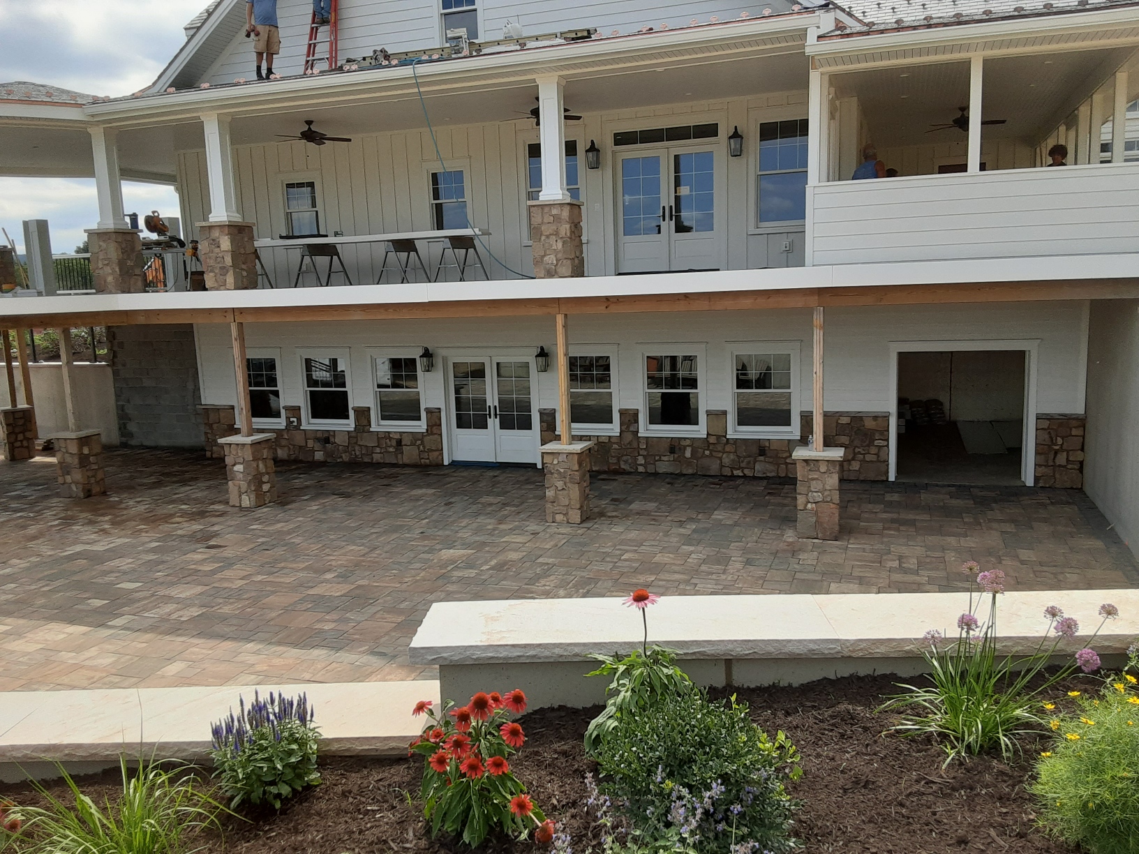 Two-level porch with stone columns
